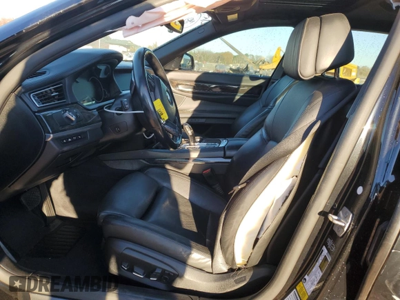 2015 BMW 7 Series 750Li with VIN WBAYE8C55FD781557, listed as a Copart auction lot 83984014 with 138,772 mi miles and Salvage Title. Bid and sale history available at carsss.com. Image 7.