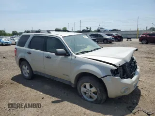 2008 Ford Escape XLT with VIN 1FMCU93198KE67763, listed as a Copart auction lot 60103005 with 147,075 mi miles and Salvage title. Bid and sale history available at DreamBid. Image 4.