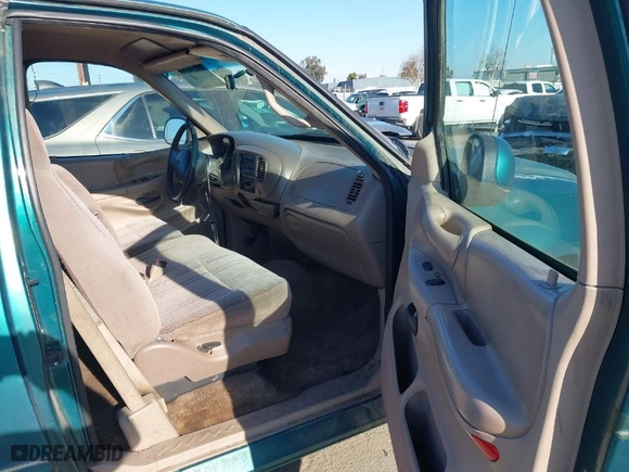 1997 Ford F-150 Standard with VIN 1FTDX1764VKB21915, listed as a IAAI auction lot 41435117 with 147,635 mi miles. Bid and sale history available at carsss.com. Image 5.