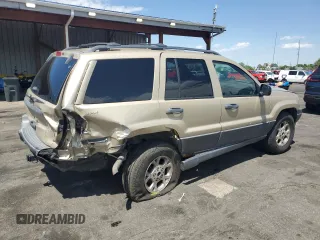 2001 Jeep Grand Cherokee Laredo z VIN 1J4GW48S61C537640, wystawiony jako Copart lot #58266135 z przebiegiem 188 475 mil mil oraz Szkoda całkowita • Salvage title. Historia ofert i sprzedaży dostępna na DreamBid. Obrazek 3.