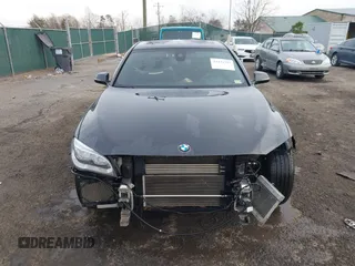 2015 BMW 7 Series 750i xDrive with VIN WBAYB6C56FG299238, listed as a IAAI auction lot 41441393 with 62,396 mi miles. Bid and sale history available at carsss.com. Image 6.