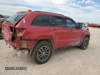 2018 Jeep Grand Cherokee Trailhawk with VIN 1C4RJFLGXJC477597, listed as a Copart auction lot 56338075 with 91,443 mi miles and Salvage title. Bid and sale history available at DreamBid. Image 3.