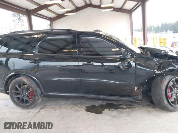 2023 Dodge Durango SRT 392 Premium with VIN 1C4SDJGJ6PC592871, listed as a IAAI auction lot 41740993 with 9,028 mi miles and . Bid and sale history available at DreamBid. Image 13.