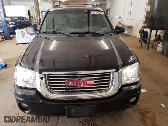 2003 GMC Envoy SLT with VIN 1GKDT13S732208692, listed as a Copart auction lot 67475514 with 243,146 mi miles and Salvage Title. Bid and sale history available at carsss.com. Image 5.