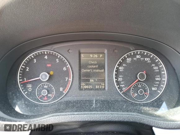 2012 Volkswagen Passat SE with VIN 1VWBH7A30CC045734, listed as a Copart auction lot 61510605 with 130,035 mi miles and Salvage title. Bid and sale history available at DreamBid. Image 9.