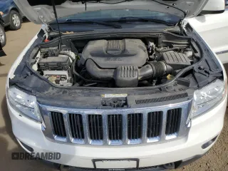 2011 Jeep Grand Cherokee Laredo with VIN 1J4RR4GG8BC718852, listed as a Copart auction lot 49852535 with 101,945 mi miles and Salvage Title. Bid and sale history available at carsss.com. Image 12.