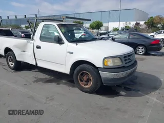 2000 Ford F-150 XL z VIN 1FTZF1724YNB21874, wystawiony jako IAAI lot #42489948 z przebiegiem 117 906 mil mil oraz . Historia ofert i sprzedaży dostępna na DreamBid. Obrazek 1.