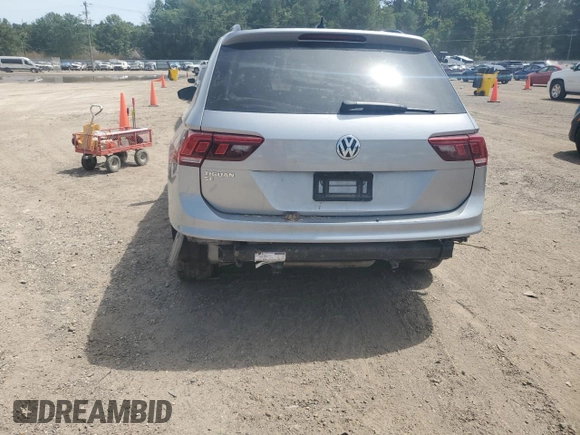 2021 Volkswagen Tiguan SE z VIN 3VV3B7AX9MM086196, wystawiony jako Copart lot #56989655 z przebiegiem 67 004 mil mil oraz Szkoda całkowita • Salvage title. Historia ofert i sprzedaży dostępna na DreamBid. Obrazek 6.