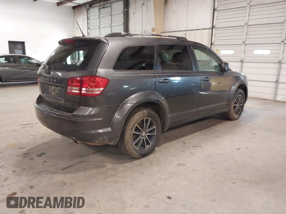 2017 Dodge Journey SE with VIN 3C4PDCAB2HT684231, listed as a IAAI auction lot 41189943 with 201,549 mi miles and . Bid and sale history available at DreamBid. Image 4.
