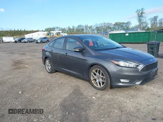 2015 Ford Focus SE with VIN 1FADP3F25FL251892, listed as a IAAI auction lot 42165182 with 144,455 mi miles. Bid and sale history available at carsss.com. Image 1.