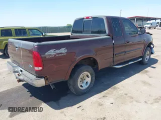 2000 Ford F-150 XL with VIN 1FTRX18L5YNA99713, listed as a IAAI auction lot 42194838 with Not provided miles and . Bid and sale history available at DreamBid. Image 4.