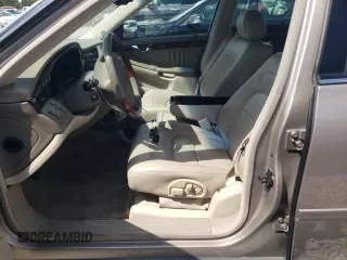 2004 Cadillac DeVille DHS z VIN 1G6KE57Y74U116879, wystawiony jako Copart lot #71017214 z przebiegiem 130 169 mil mil oraz Szkoda całkowita • Salvage title. Historia ofert i sprzedaży dostępna na DreamBid. Obrazek 7.