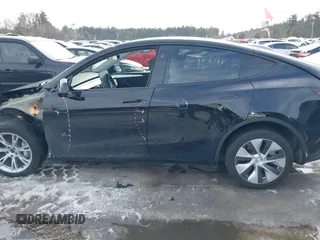 2023 Tesla Model Y Long Range z VIN 7SAYGDEE8PF826989, wystawiony jako IAAI lot #41615166 z przebiegiem 10 368 mil mil oraz . Historia ofert i sprzedaży dostępna na DreamBid. Obrazek 15.