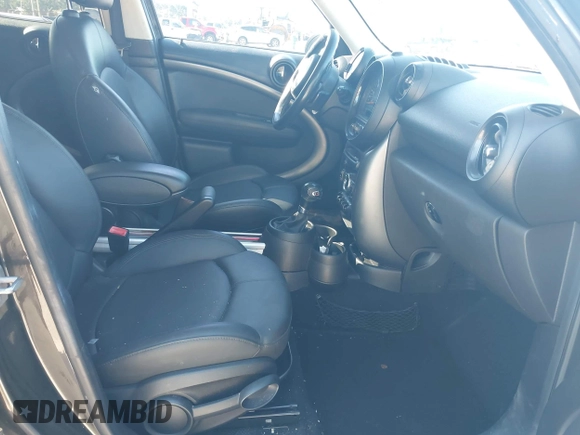 2015 MINI Countryman S with VIN WMWZC3C58FWT04316, listed as a IAAI auction lot 42525698 with 97,046 mi miles and . Bid and sale history available at DreamBid. Image 5.