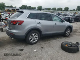 2014 Mazda CX-9 Touring с VIN JM3TB2CA2E0431879, выставлен на аукционе Copart как лот 64778845 с пробегом 145 476 миль миль и Чистый • Clean title. История ставок и продаж доступна на DreamBid. Изображение 3.