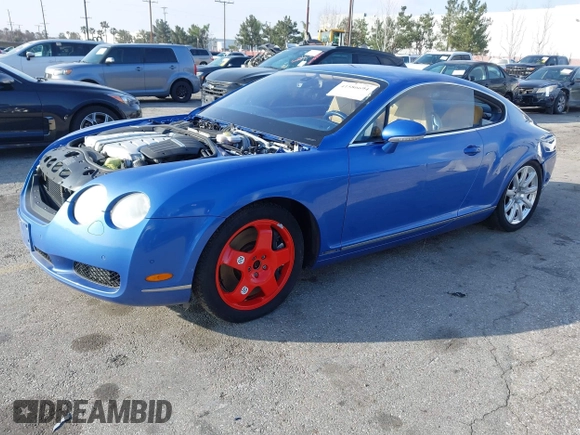 2004 Bentley Continental GT GT z VIN SCBCR63W74C022462, wystawiony jako IAAI lot #41586694 z przebiegiem 36 966 mil mil oraz . Historia ofert i sprzedaży dostępna na DreamBid. Obrazek 2.