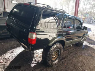1997 Toyota 4Runner Limited with VIN JT3HN87R9V0073242, listed as a IAAI auction lot 41664630 with 189,225 mi miles. Bid and sale history available at carsss.com. Image 4.