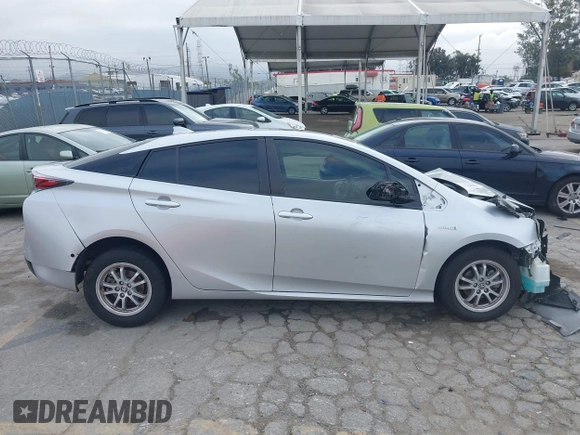 2018 Toyota Prius Two with VIN JTDKARFU0J3056217, listed as a IAAI auction lot 42185122 with 52,344 mi miles and . Bid and sale history available at DreamBid. Image 14.