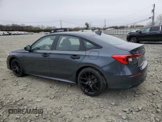 2023 Honda Civic Sport z VIN 2HGFE2F50PH556908, wystawiony jako Copart lot #52789655 z przebiegiem Nie podano mil oraz Szkoda całkowita • Salvage title. Historia ofert i sprzedaży dostępna na DreamBid. Obrazek 2.