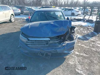 2021 Volkswagen Jetta S z VIN 3VWC57BU0MM054745, wystawiony jako IAAI lot #39772920 z przebiegiem 31 453 mil mil oraz . Historia ofert i sprzedaży dostępna na DreamBid. Obrazek 12.