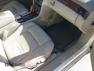 2002 Cadillac Seville Luxury SLS z VIN 1G6KS54Y52U231880, wystawiony jako IAAI lot #40911457 z przebiegiem 148 100 mil mil oraz . Historia ofert i sprzedaży dostępna na DreamBid. Obrazek 5.