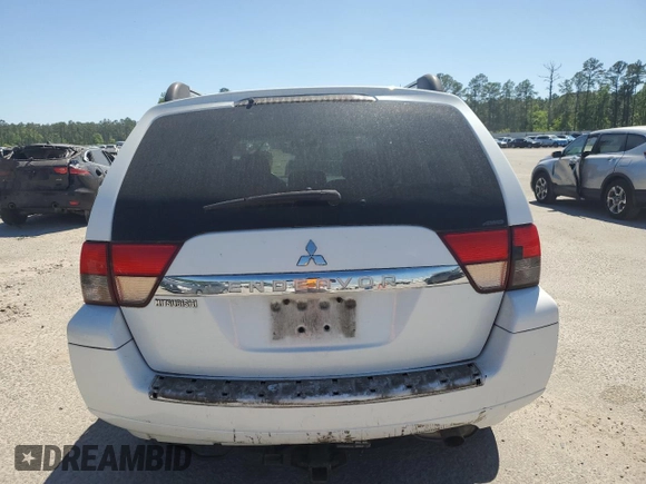 2011 Mitsubishi Endeavor LS z VIN 4A4JN2AS3BE032912, wystawiony jako Copart lot #53040125 z przebiegiem 132 709 mil mil oraz Szkoda całkowita • Salvage title. Historia ofert i sprzedaży dostępna na DreamBid. Obrazek 6.
