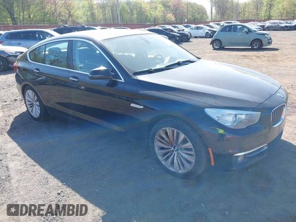 2014 BMW 5 Series GT 535i Gran Turismo xDrive with VIN WBA5M4C56ED183815, listed as a IAAI auction lot 42155348 with 150,357 mi miles and . Bid and sale history available at carsss.com. Image 1.