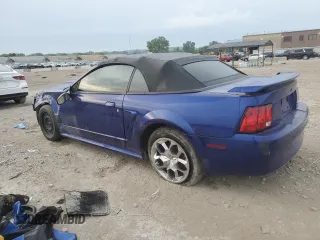 2004 Ford Mustang Deluxe with VIN 1FAFP444X4F107575, listed as a Copart auction lot 60908705 with 148,467 mi miles and Salvage title. Bid and sale history available at DreamBid. Image 2.