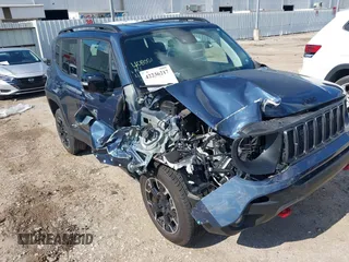 2023 Jeep Renegade Trailhawk with VIN ZACNJDC19PPP70231, listed as a IAAI auction lot 42236217 with 30,880 mi miles and . Bid and sale history available at DreamBid. Image 6.
