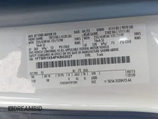 2023 Ford Transit Cargo with VIN 1FTBR1X84PKB02027, listed as a IAAI auction lot 42062820 with 79,813 mi miles and . Bid and sale history available at DreamBid. Image 9.