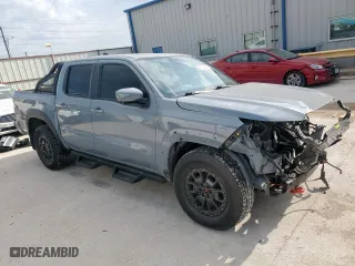 2022 Nissan Frontier SV with VIN 1N6ED1EJ6NN607478, listed as a Copart auction lot 50645445 with 51,509 mi miles and Salvage Title. Bid and sale history available at carsss.com. Image 4.