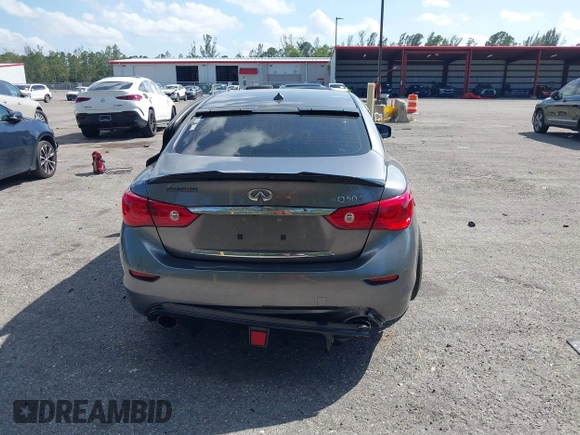 2014 Infiniti Q50 Sport with VIN JN1BV7AP4EM670443, listed as a IAAI auction lot 41801219 with 98,719 mi miles and . Bid and sale history available at DreamBid. Image 16.