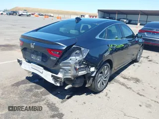 2022 Honda Insight Touring with VIN 19XZE4F90NE001251, listed as a IAAI auction lot 42303914 with 161,489 mi miles and . Bid and sale history available at DreamBid. Image 4.