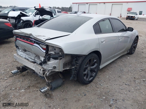 2019 Dodge Charger R/T with VIN 2C3CDXCT2KH605656, listed as a IAAI auction lot 41464186 with 118,254 mi miles. Bid and sale history available at carsss.com. Image 4.
