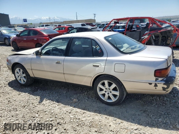 1996 Toyota Camry LE with VIN 4T1BF12K3TU132870, listed as a Copart auction lot 58052975 with 88,210 mi miles and Salvage title. Bid and sale history available at DreamBid. Image 2.