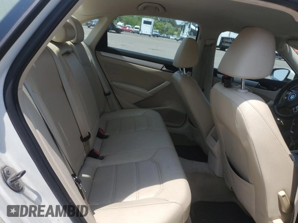 2012 Volkswagen Passat SE z VIN 1VWBP7A38CC091797, wystawiony jako Copart lot #62032205 z przebiegiem 198 594 mil mil oraz Czysty tytuł • Clean title. Historia ofert i sprzedaży dostępna na DreamBid. Obrazek 10.