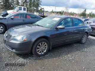 2006 Nissan Altima 2.5 with VIN 1N4AL11D06N304367, listed as a IAAI auction lot 41808294 with 198,815 mi miles. Bid and sale history available at carsss.com. Image 15.