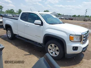 2016 GMC Canyon 4WD SLE z VIN 1GTH6CE32G1331480, wystawiony jako IAAI lot #42472439 z przebiegiem 74 582 mil mil oraz . Historia ofert i sprzedaży dostępna na DreamBid. Obrazek 1.