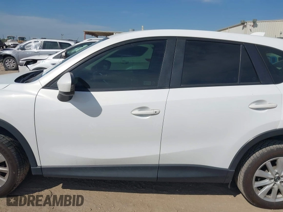 2013 Mazda CX-5 Sport z VIN JM3KE2BE5D0135213, wystawiony jako IAAI lot #42270730 z przebiegiem 140 917 mil mil oraz . Historia ofert i sprzedaży dostępna na DreamBid. Obrazek 14.