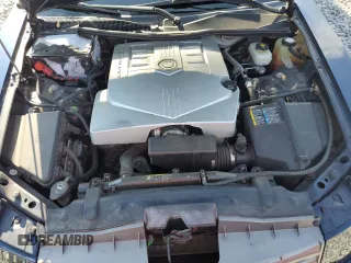 2005 Cadillac CTS z VIN 1G6DP567150114713, wystawiony jako Copart lot #58413445 z przebiegiem 71 927 mil mil oraz Szkoda całkowita • Salvage title. Historia ofert i sprzedaży dostępna na DreamBid. Obrazek 11.