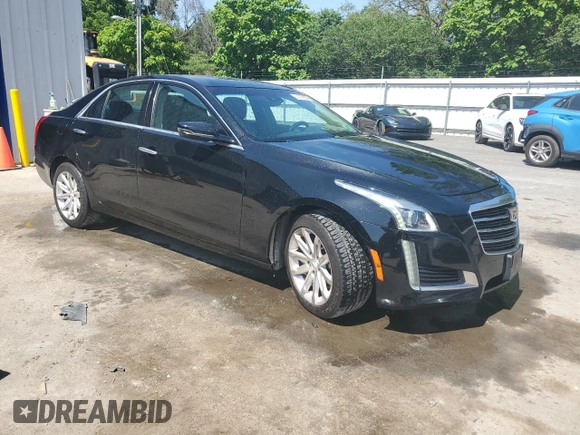 2015 Cadillac CTS Luxury AWD с VIN 1G6AX5SX0F0105415, выставлен на аукционе Copart как лот 62143995 с пробегом 72 614 миль миль и Списание • Salvage title. История ставок и продаж доступна на DreamBid. Изображение 4.