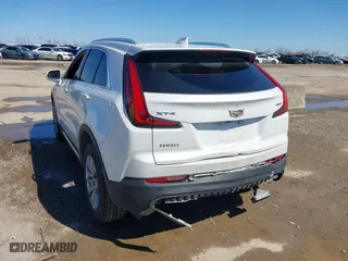 2020 Cadillac XT4 FWD Premium Luxury with VIN 1GYFZCR45LF138622, listed as a IAAI auction lot 41764535 with 99,079 mi miles. Bid and sale history available at carsss.com. Image 6.