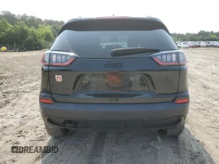 2022 Jeep Cherokee X with VIN 1C4PJMCX1ND526231, listed as a Copart auction lot 57551585 with 77,157 mi miles and Salvage title. Bid and sale history available at DreamBid. Image 6.