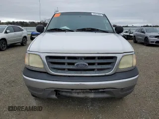 2003 Ford F-150 XL with VIN 2FTRX18W53CA80751, listed as a Copart auction lot 85313664 with 286,105 mi miles and Salvage Title. Bid and sale history available at carsss.com. Image 5.