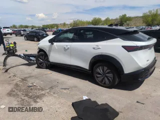 2023 Nissan ARIYA Platinum+ with VIN JN1DF0CD6PM710086, listed as a Copart auction lot 56642525 with 13,373 mi miles and Salvage title. Bid and sale history available at DreamBid. Image 2.