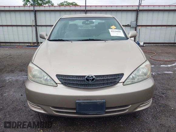2002 Toyota Camry LE z VIN 4T1BE32K52U086150, wystawiony jako IAAI lot #42126685 z przebiegiem 175 212 mil mil oraz . Historia ofert i sprzedaży dostępna na DreamBid. Obrazek 12.