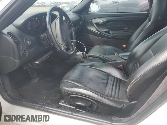 2000 Porsche Boxster z VIN WP0CA2983YU620313, wystawiony jako Copart lot #54605995 z przebiegiem 134 807 mil mil oraz Tytuł czysty. Historia ofert i sprzedaży dostępna na DreamBid. Obrazek 7.