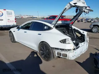 2022 Tesla Model S Plaid with VIN 5YJSA1E64NF479959, listed as a IAAI auction lot 41057673 with 27,203 mi miles. Bid and sale history available at carsss.com. Image 3.