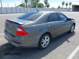 2011 Ford Fusion SE with VIN 3FAHP0HA9BR113630, listed as a IAAI auction lot 42024520 with 126,174 mi miles. Bid and sale history available at carsss.com. Image 4.