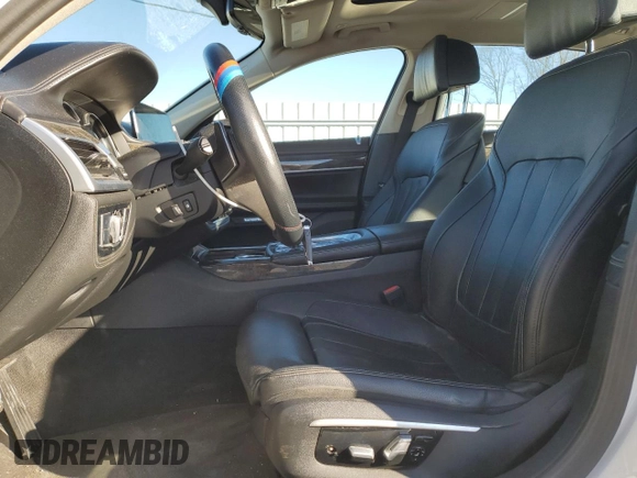 2017 BMW 7 Series 740i with VIN WBA7E2C32HG740649, listed as a Copart auction lot 45593145 with 122,793 mi miles and Salvage Title. Bid and sale history available at carsss.com. Image 7.